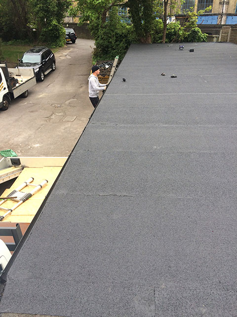A finished roofing project by Thomas Roofing &mdash; pitched tile roof, North London